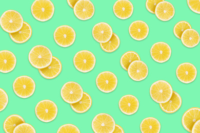 Image of Pattern of lemon slices on aquamarine background