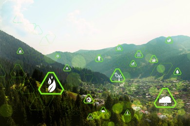 Image of Digital eco icons and beautiful landscape with forest and village in mountains