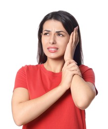 Photo of Young woman suffering from ear pain on white background
