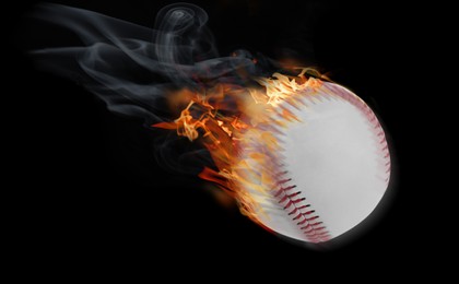 Image of Burning baseball ball flying at high speed on black background