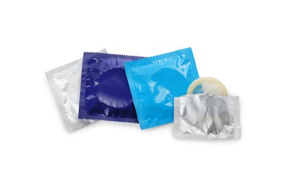 Photo of Condoms on white background, top view. Safe sex