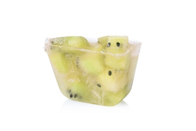Photo of Ice cube with cut kiwi on white background