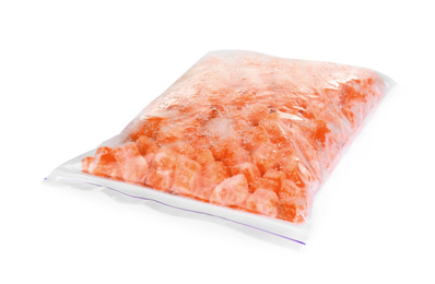 Photo of Frozen carrots in plastic bag isolated on white. Vegetable preservation