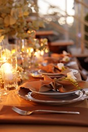 Photo of Elegant table setting with beautiful floral decor