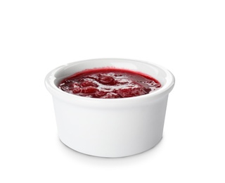 Bowl of cranberry sauce on white background