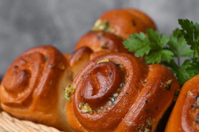 Photo of Delicious pampushky (buns) with garlic, closeup view