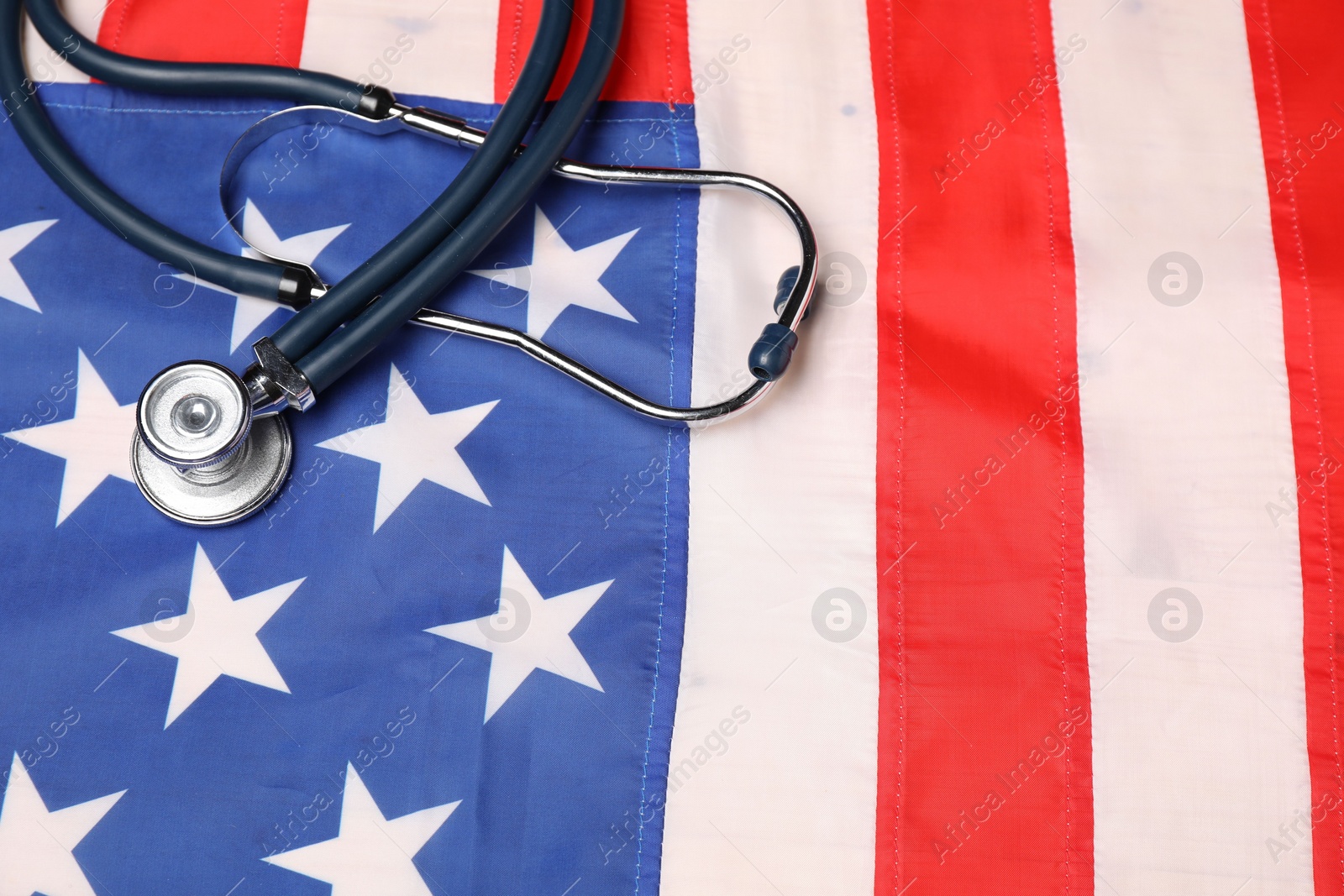 Photo of Stethoscope on USA flag, above view. Health care concept