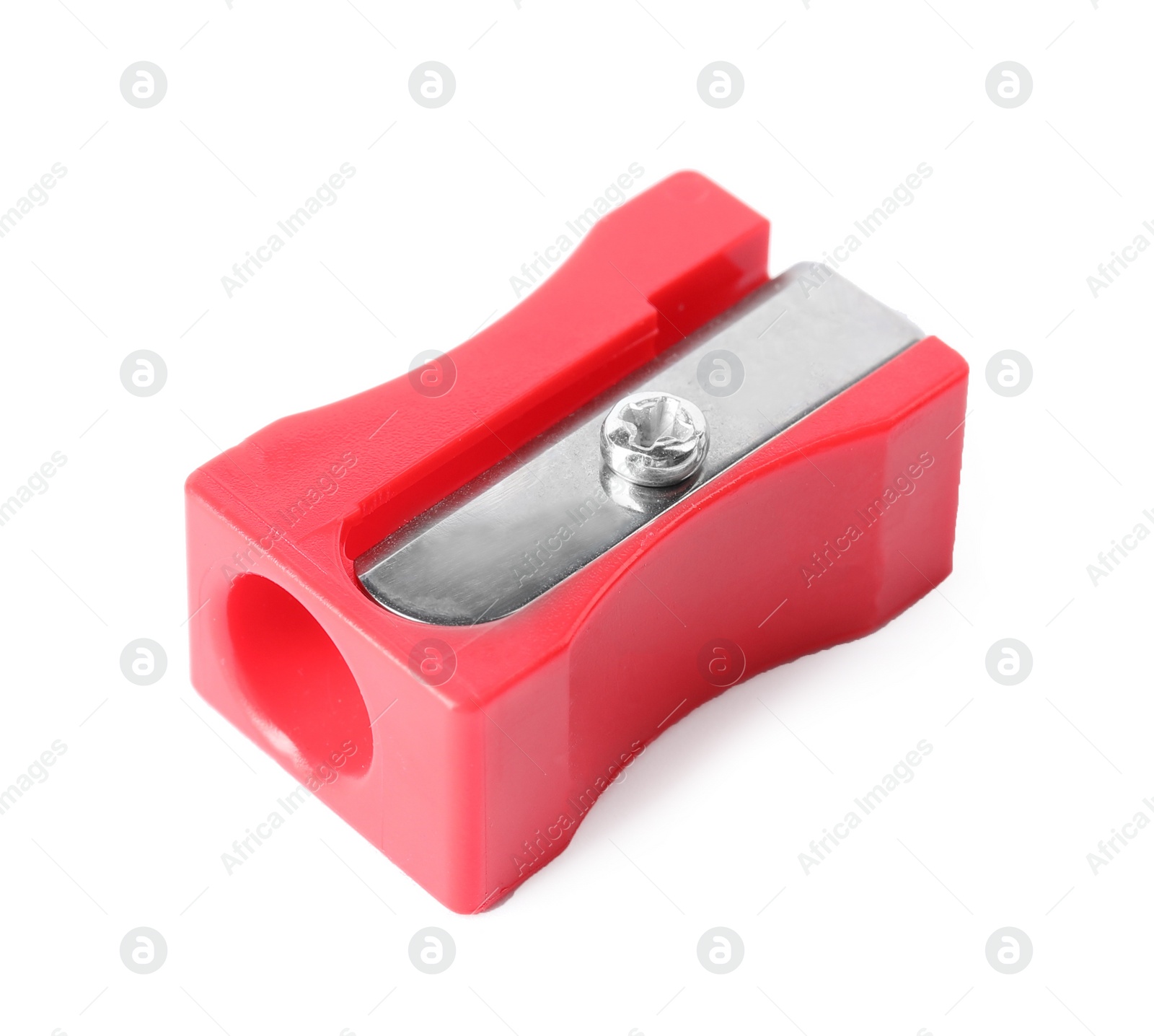 Image of Bright red pencil sharpener isolated on white. School stationery