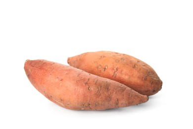 Photo of Whole ripe sweet potatoes on white background