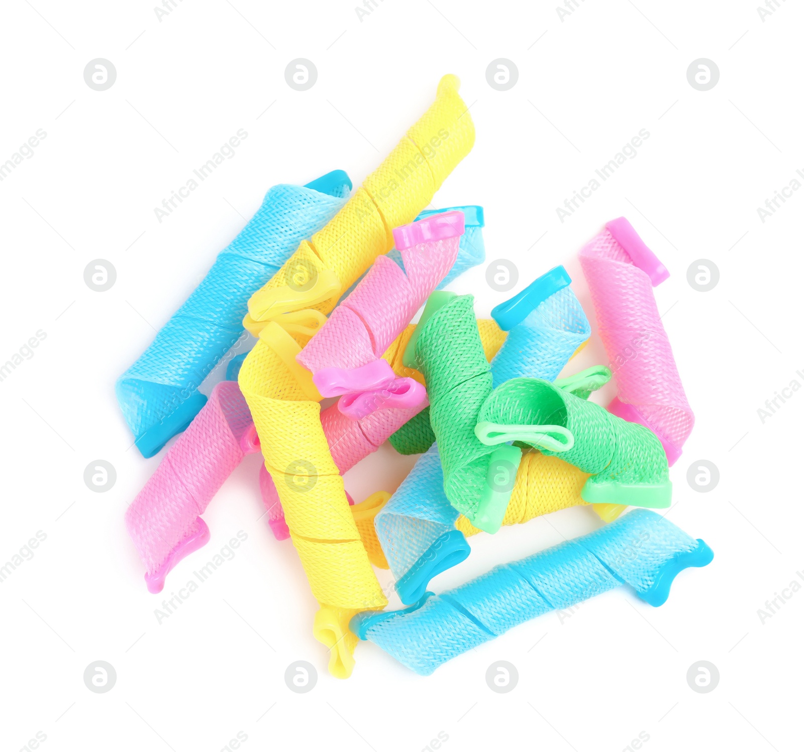 Photo of Hair curlers isolated on white, top view. Styling tool
