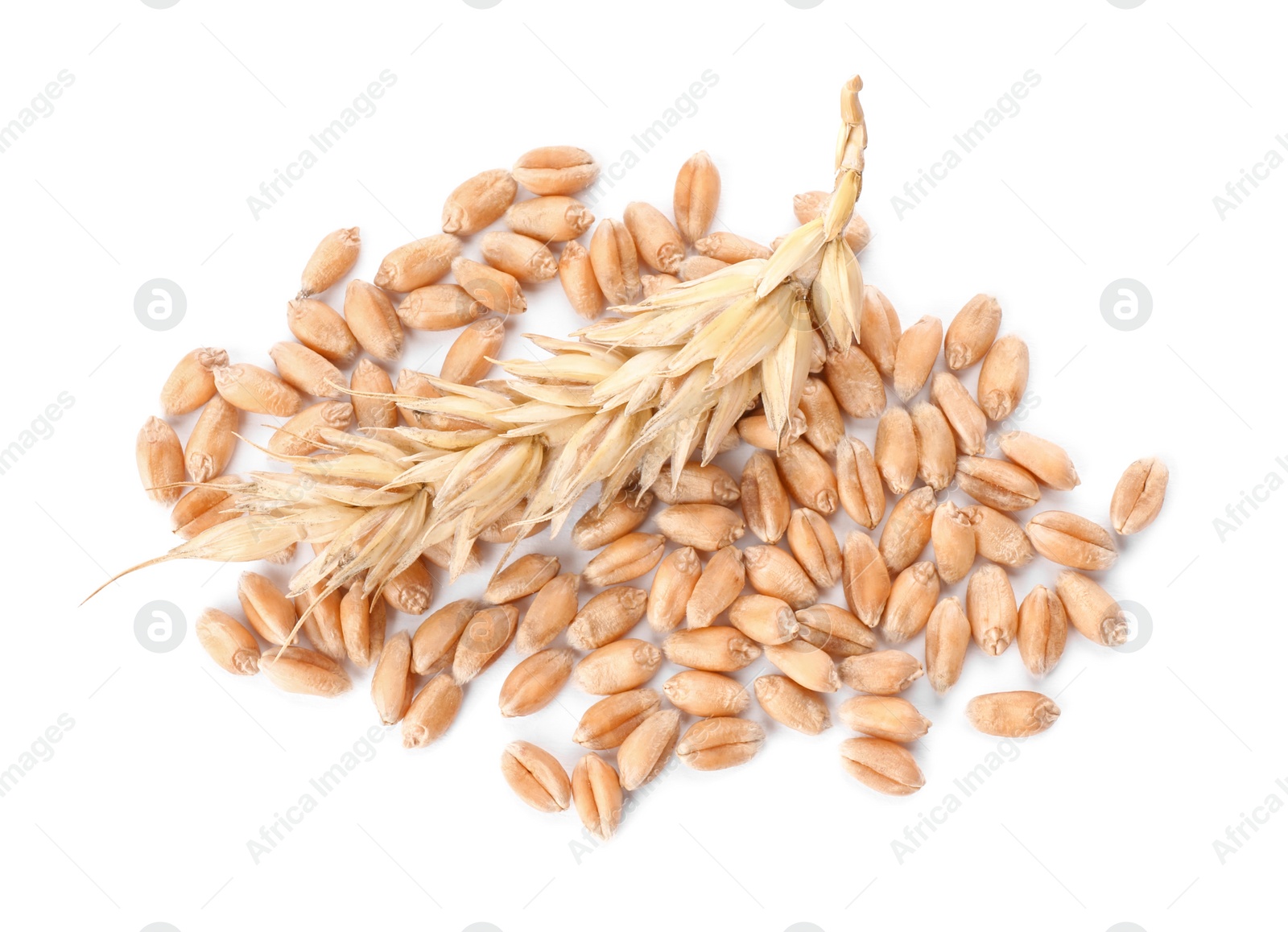 Photo of Pile of wheat grains and spike on white background, top view