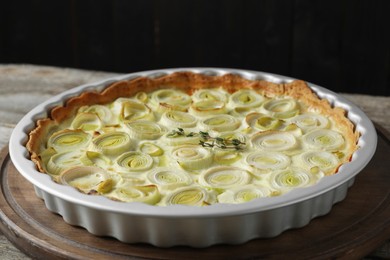 Photo of Freshly baked leek pie on table, closeup