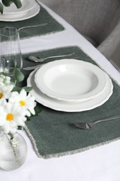 Elegant festive setting with floral decor on table