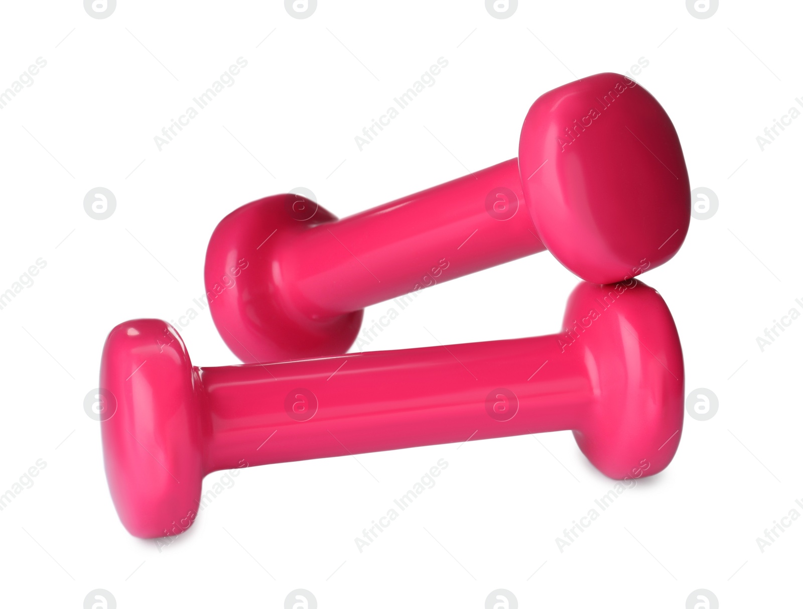 Photo of Pink dumbbells on white background. Weight training equipment