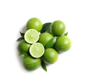 Photo of Fresh ripe limes on white background, top view