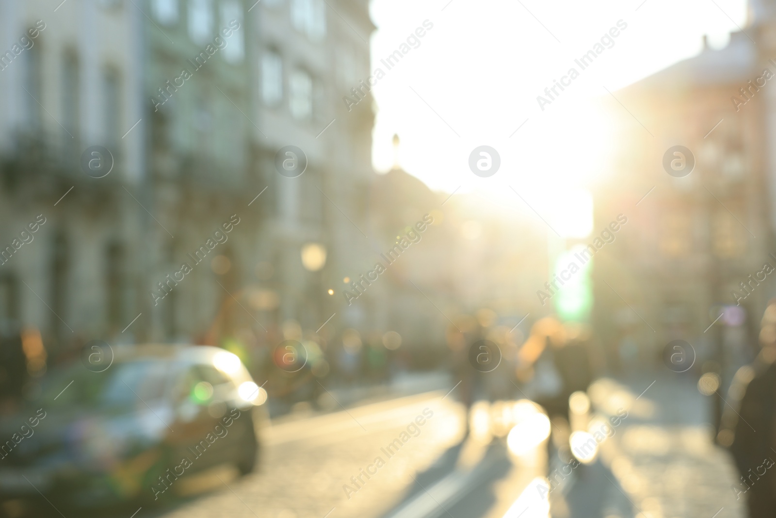 Photo of Blurred view of people walking on city street