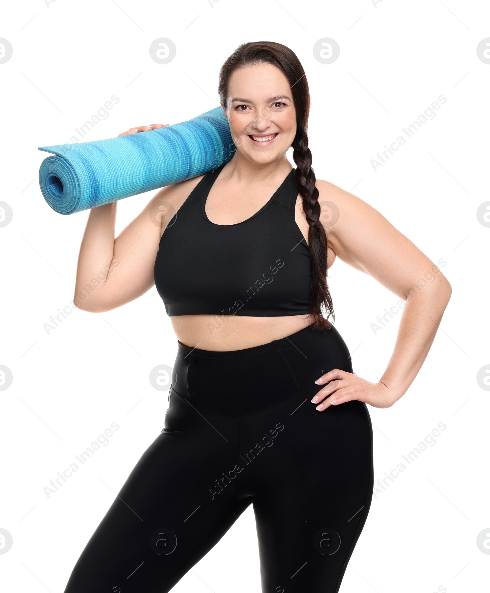 Photo of Happy overweight woman with yoga mat on white background