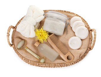 Spa gift set with different products in wicker basket on white background, top view