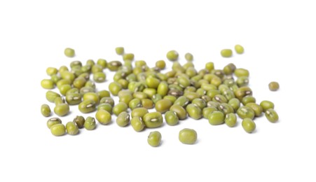 Pile of green mung beans on white background. Organic grains