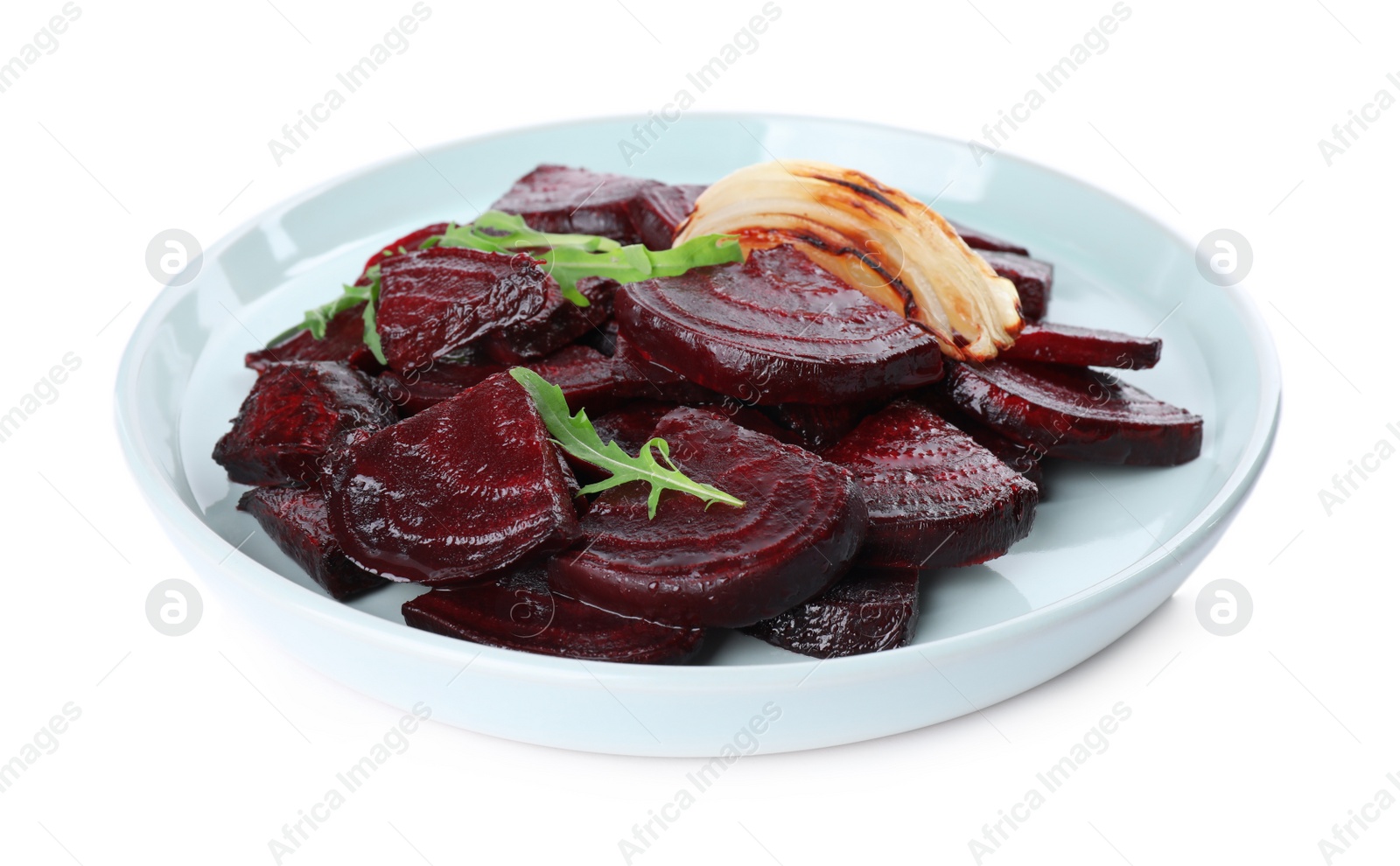 Photo of Plate with roasted beetroot slices, arugula and onion isolated on white