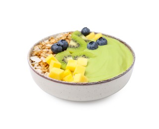 Photo of Tasty matcha smoothie bowl served with fresh fruits and oatmeal isolated on white. Healthy breakfast