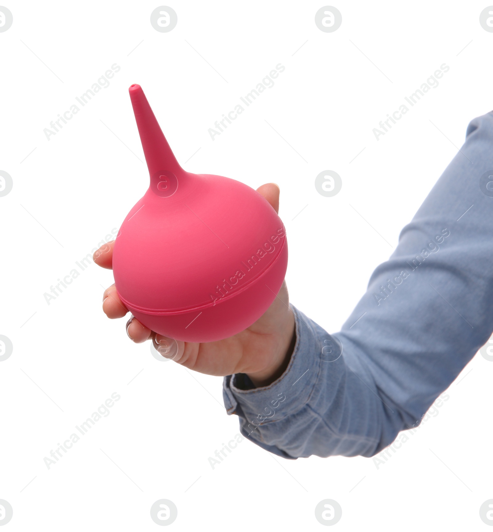 Photo of Woman holding pink enema on white background, closeup