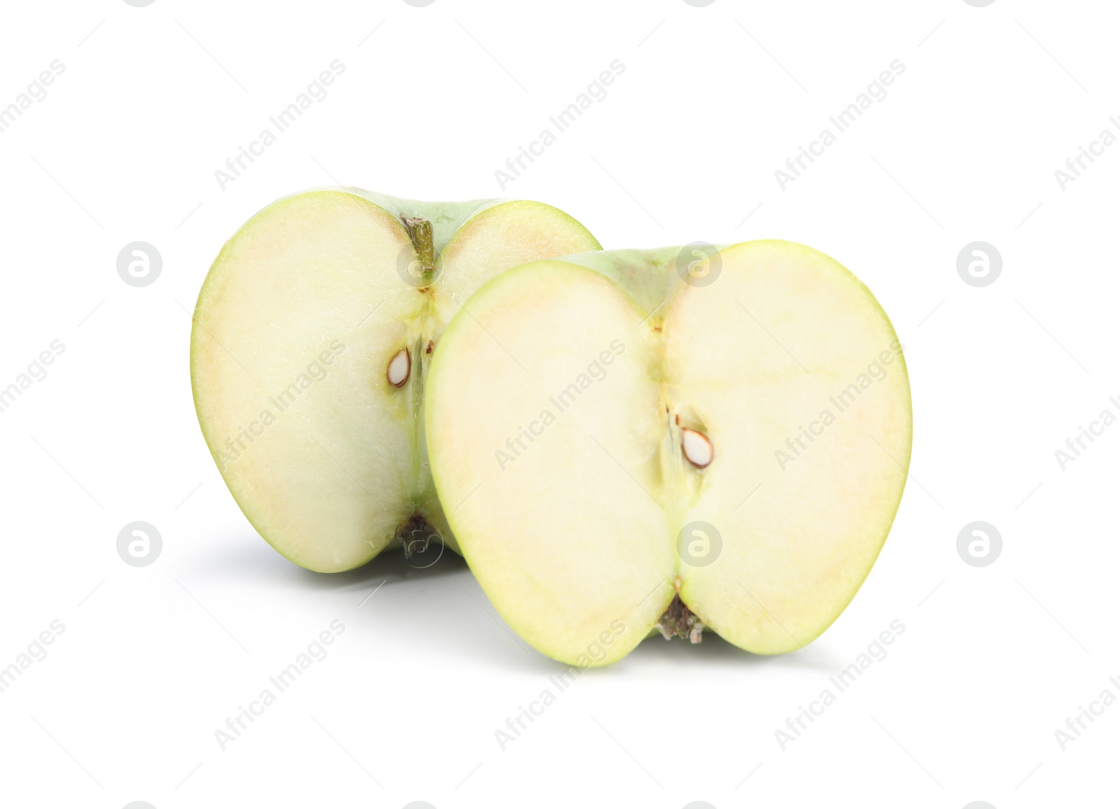 Photo of Halves of fresh green apple on white background