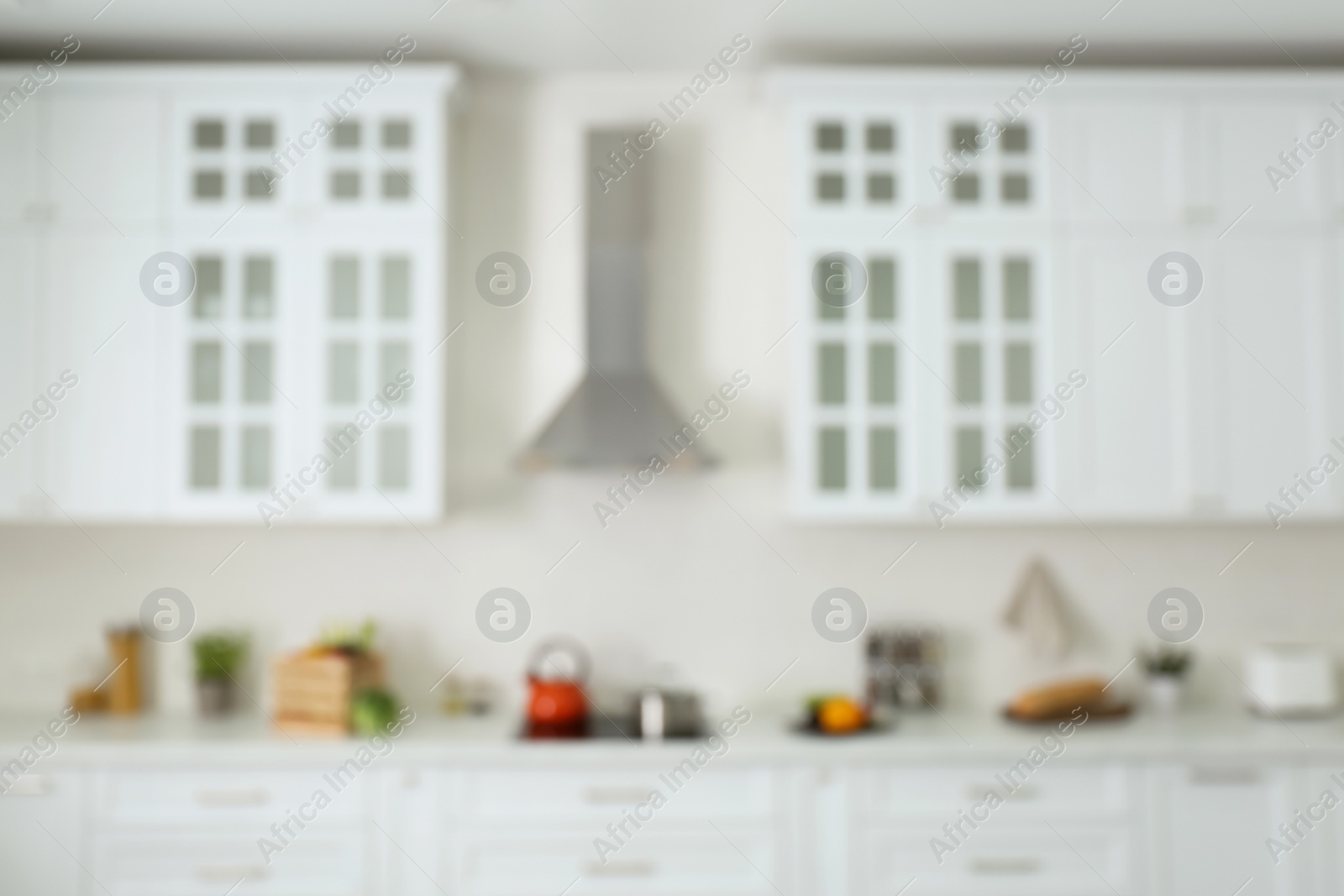 Photo of Blurred view of modern kitchen interior with stylish furniture