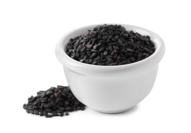 Raw black sesame seeds with bowl on white background