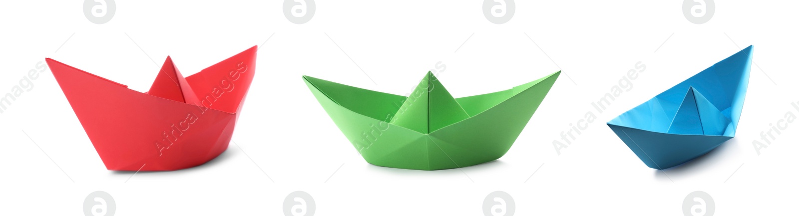 Image of Set with multicolor paper boats on white background. Banner design