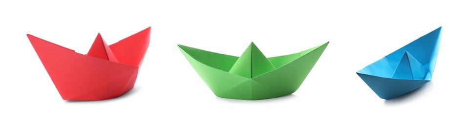 Image of Set with multicolor paper boats on white background. Banner design