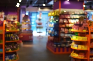 Photo of Blurred view of supermarket interior with different products