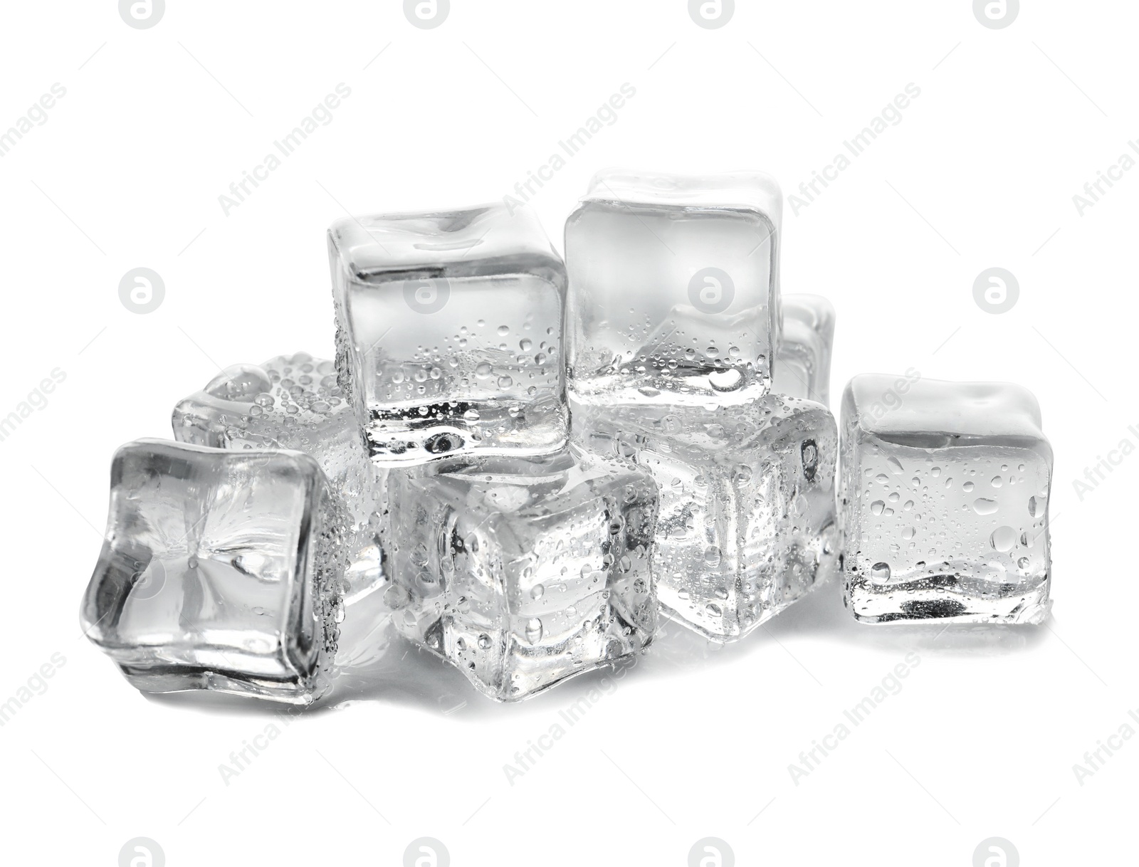 Photo of Pile of crystal clear ice cubes on white background