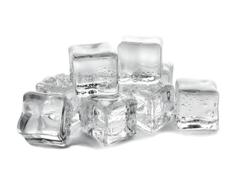 Pile of crystal clear ice cubes on white background