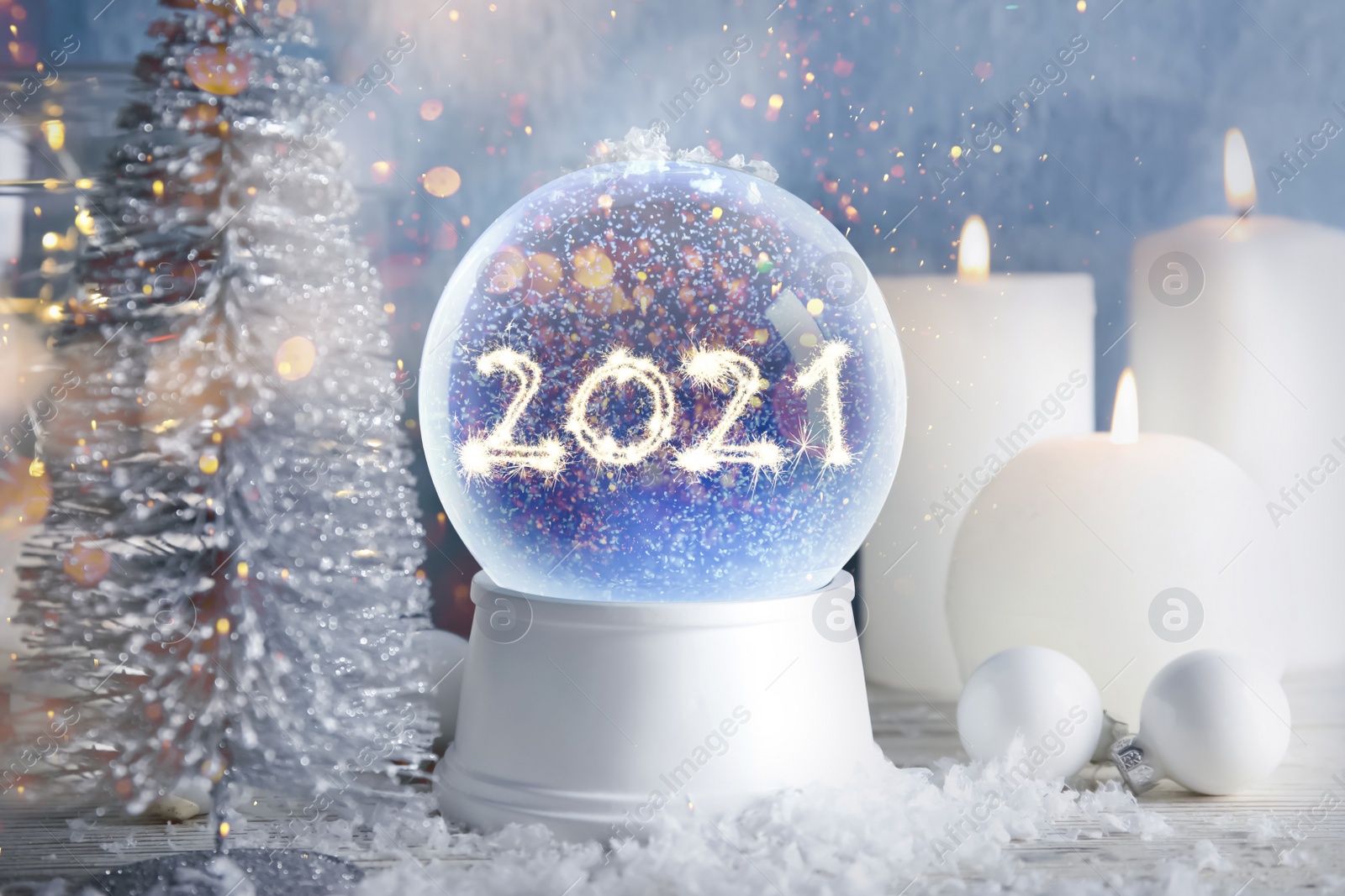 Image of 2021 New Year greeting card design. Snow globe with numbers