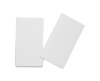 Blank business cards isolated on white, top view. Mockup for design