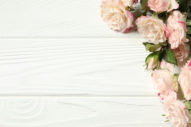 Photo of Happy Mother's Day. Beautiful flowers on white wooden table, flat lay. Space for text