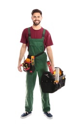 Full length portrait of professional construction worker with tools on white background