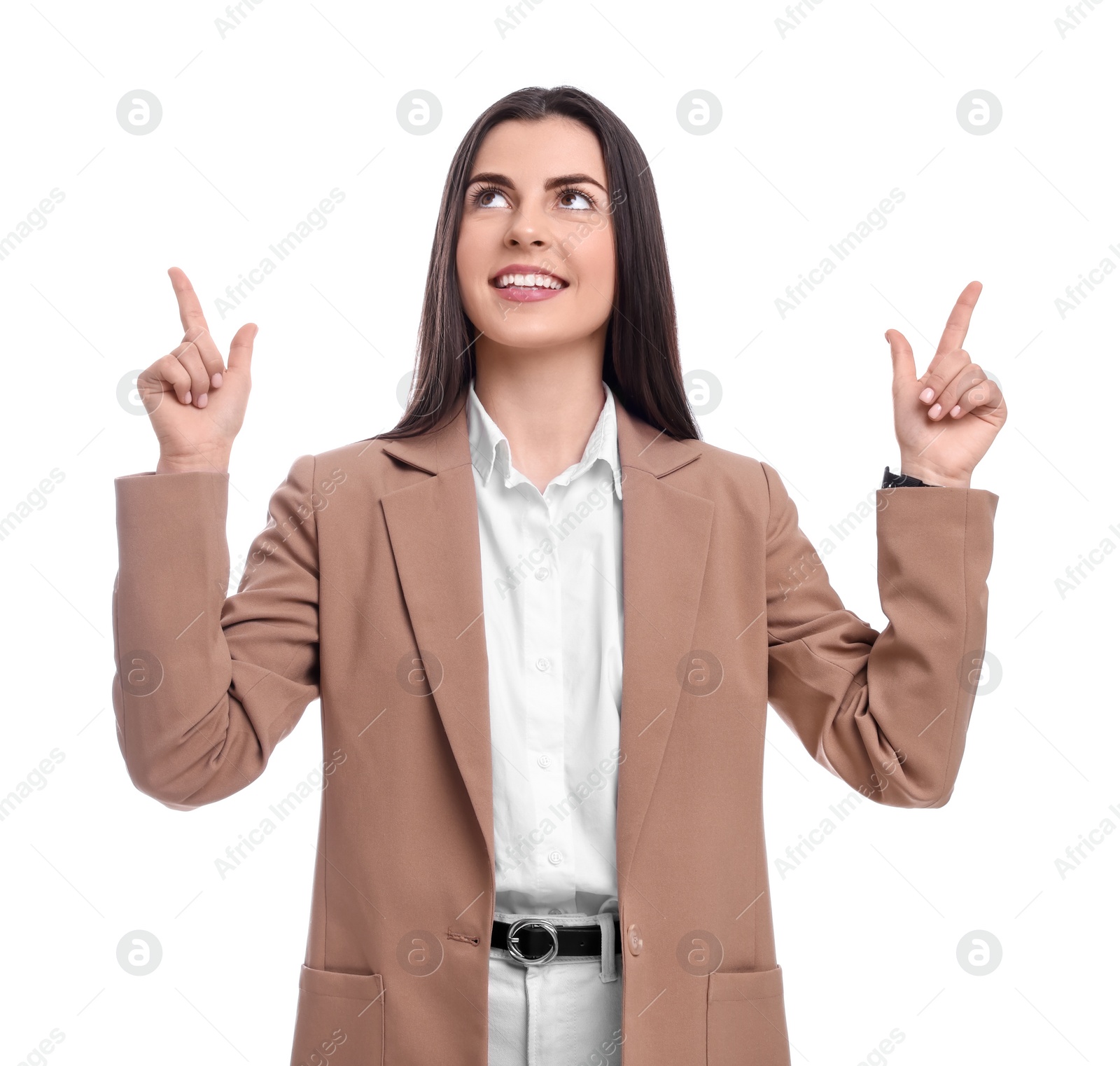 Photo of Beautiful happy businesswoman pointing at something on white background