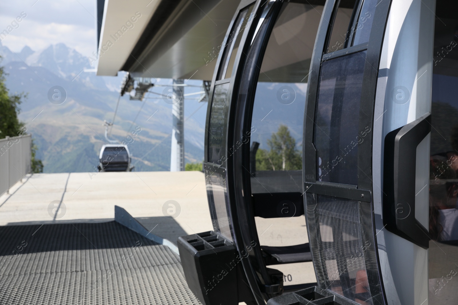 Photo of Modern large cabins on cableway near mountain outdoors