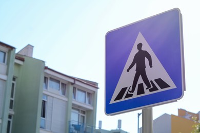 Photo of Post with traffic sign Pedestrian Crossing outdoors, space for text