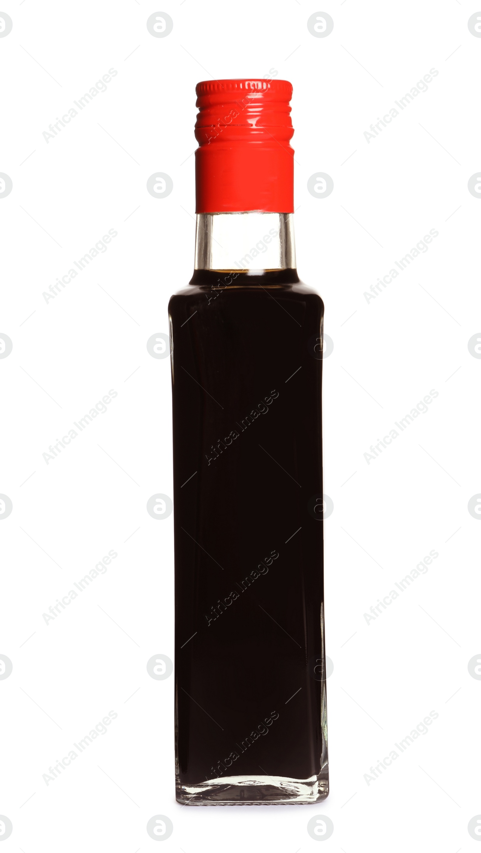 Photo of Traditional soy sauce in glass bottle on white background