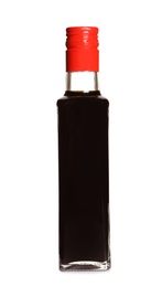 Photo of Traditional soy sauce in glass bottle on white background