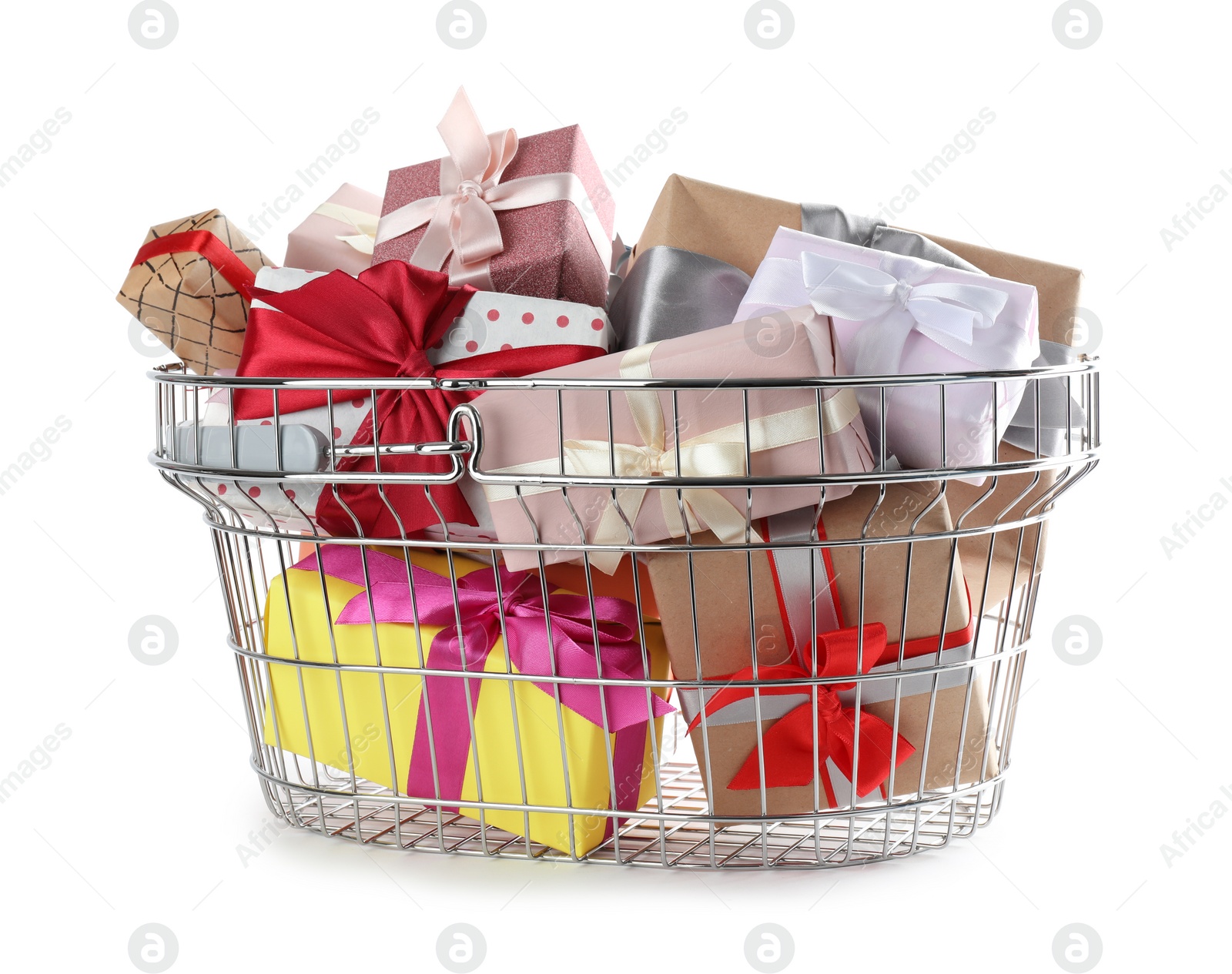 Photo of Shopping basket full of gift boxes on white background