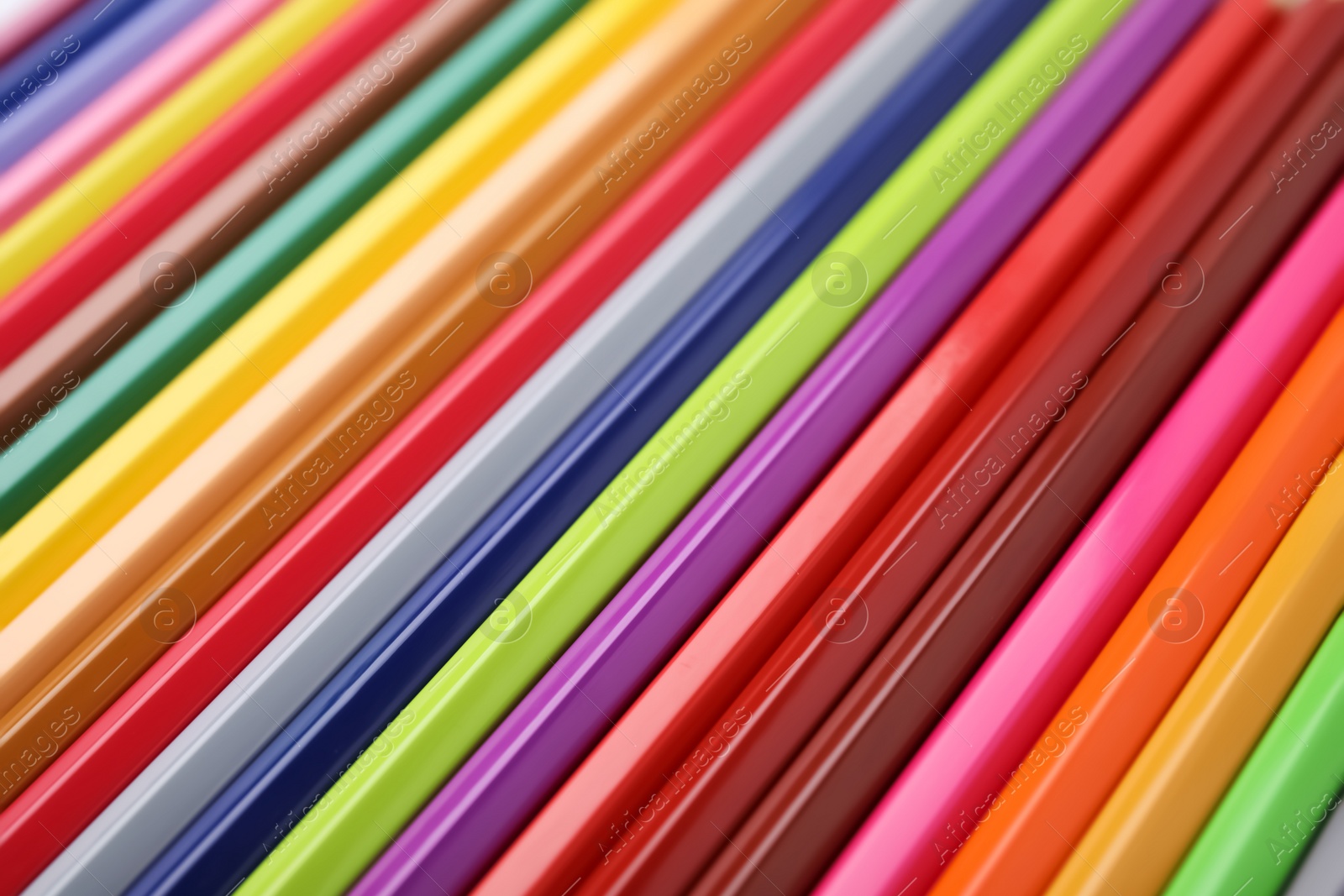 Photo of Many colorful wooden pencils as background, closeup