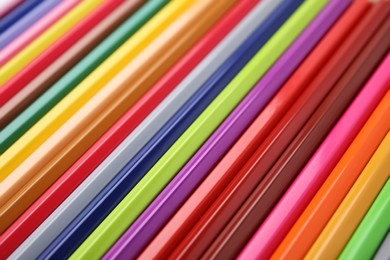 Photo of Many colorful wooden pencils as background, closeup