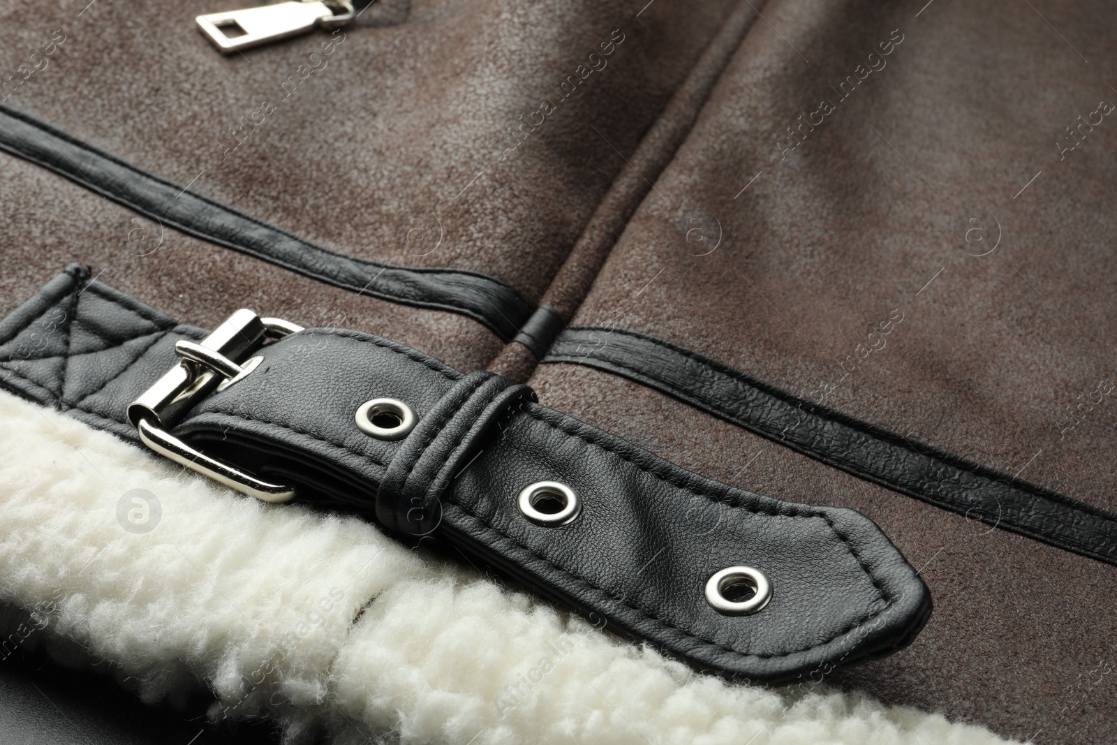 Photo of Brown suede jacket as background, closeup view