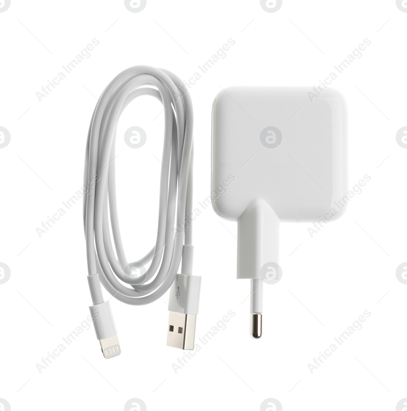 Photo of USB charger isolated on white, top view. Modern technology