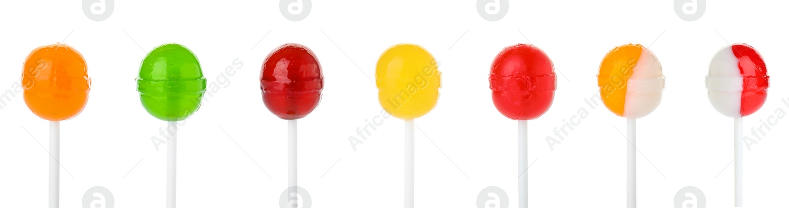 Image of Set of delicious candies on white background. Banner design