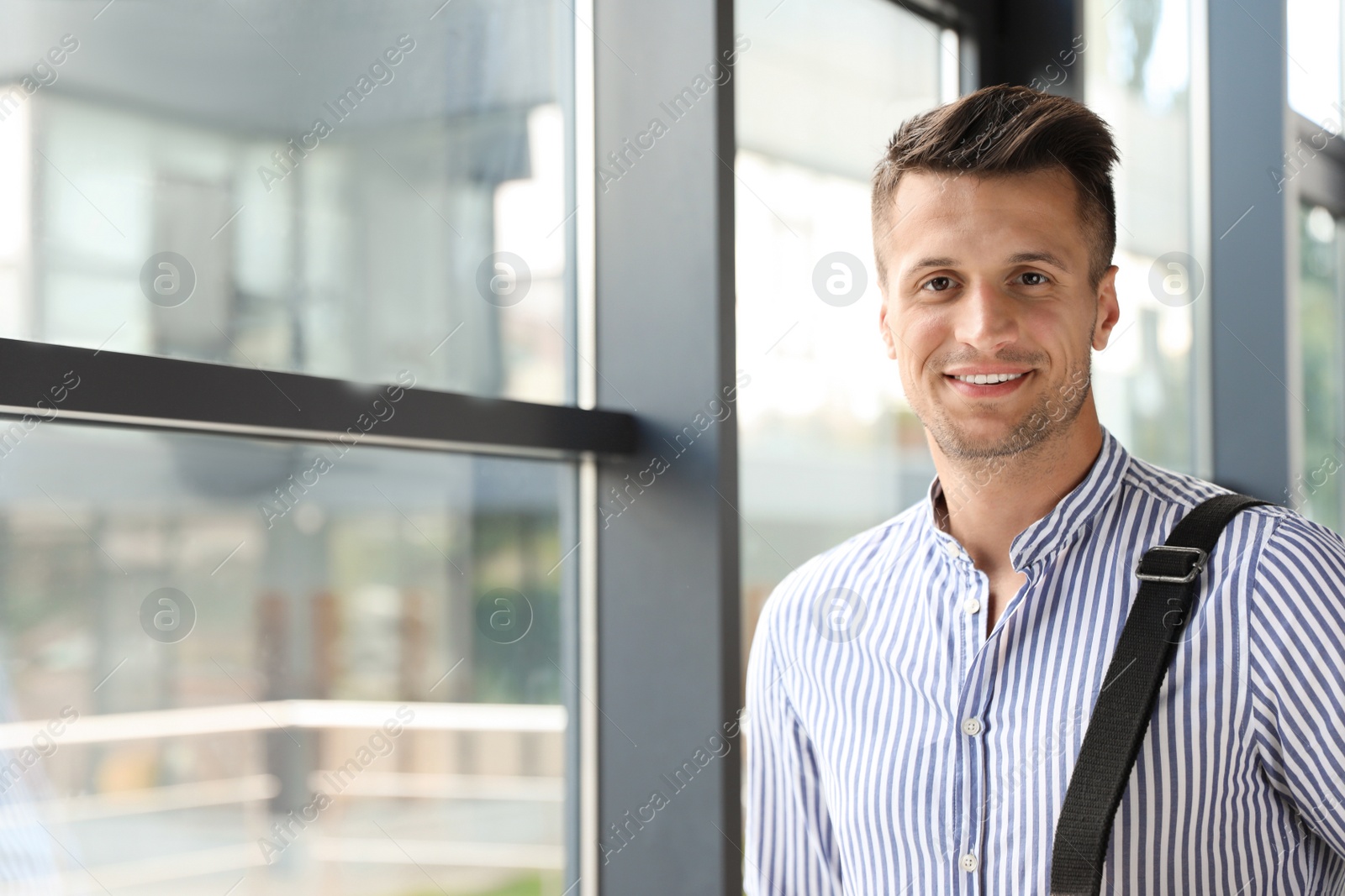 Photo of Portrait of male business trainer in office wear indoors